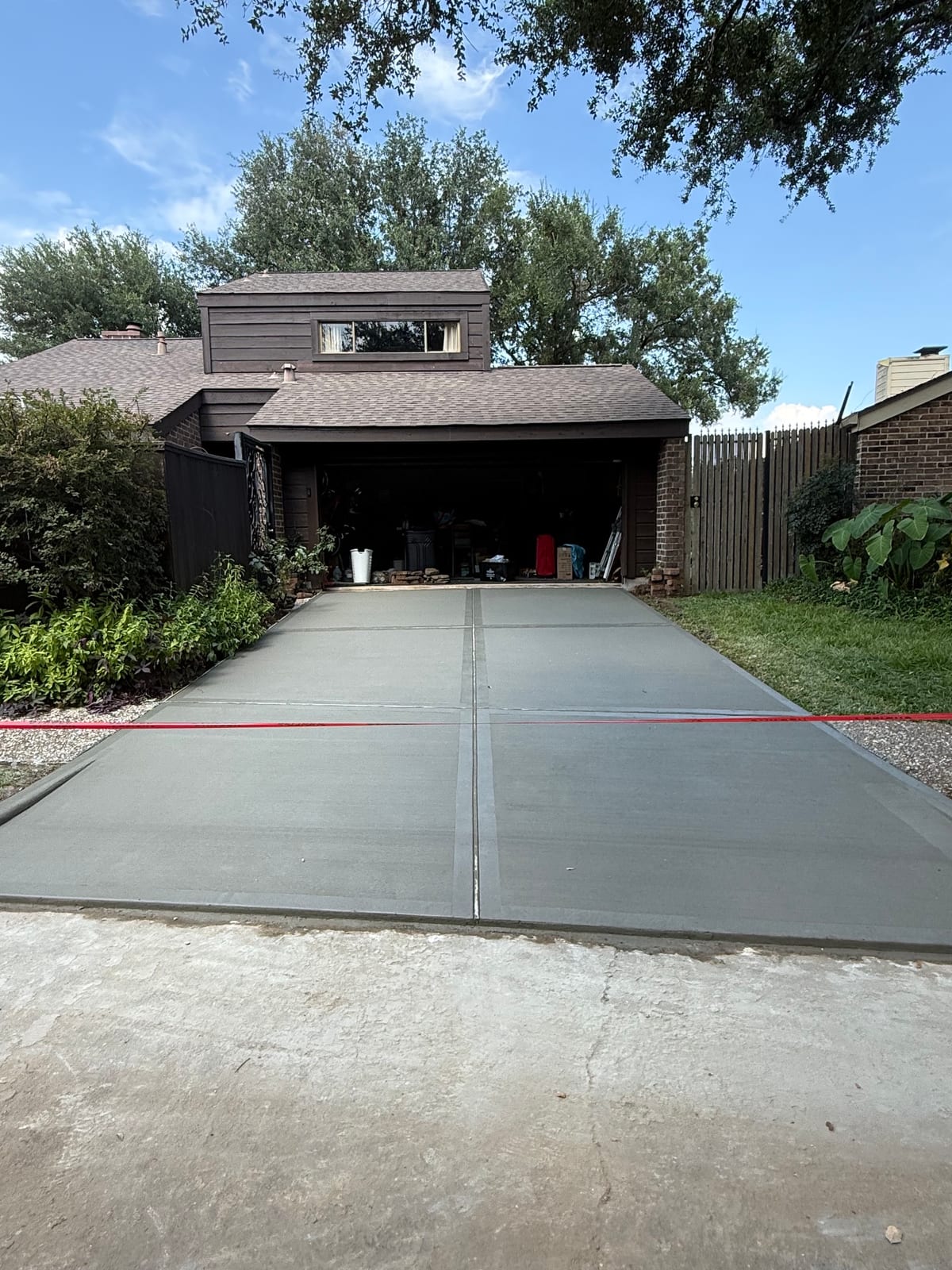 Concrete side driveway and flatwork by Art & Floors