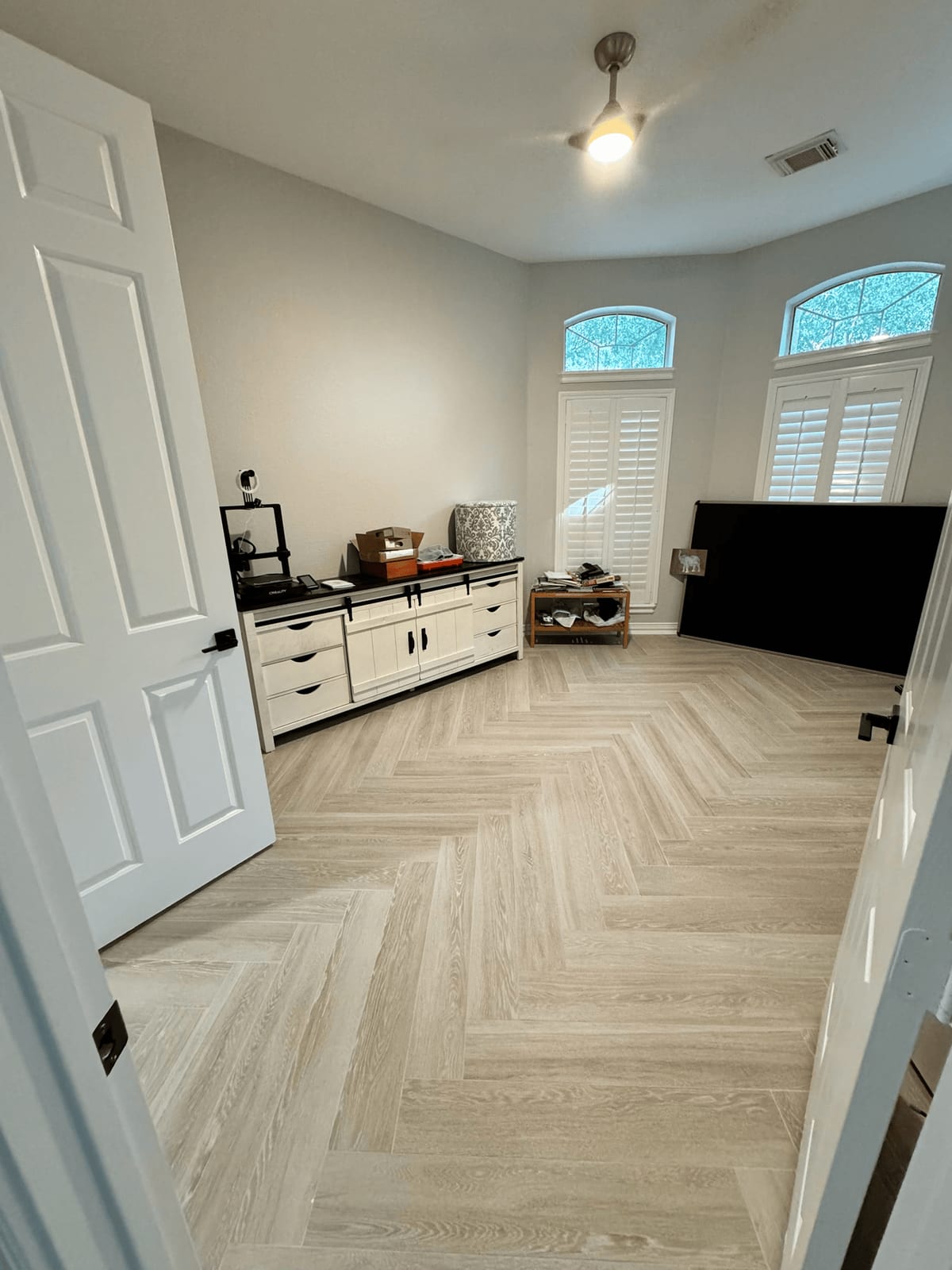 Light herringbone luxury vinyl flooring