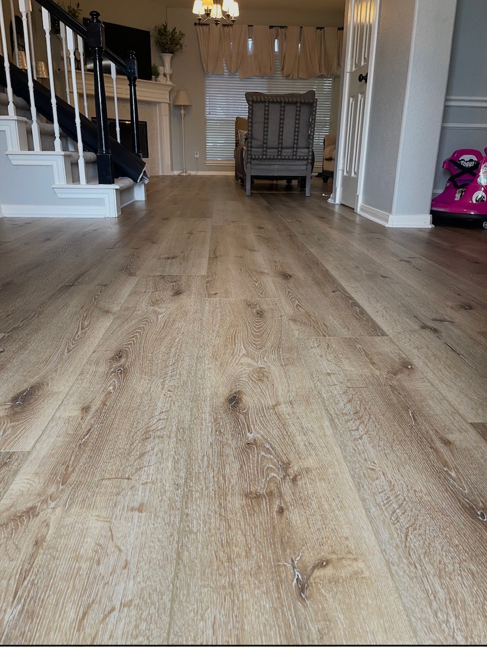 Wood-look wide-plank flooring in an open living area